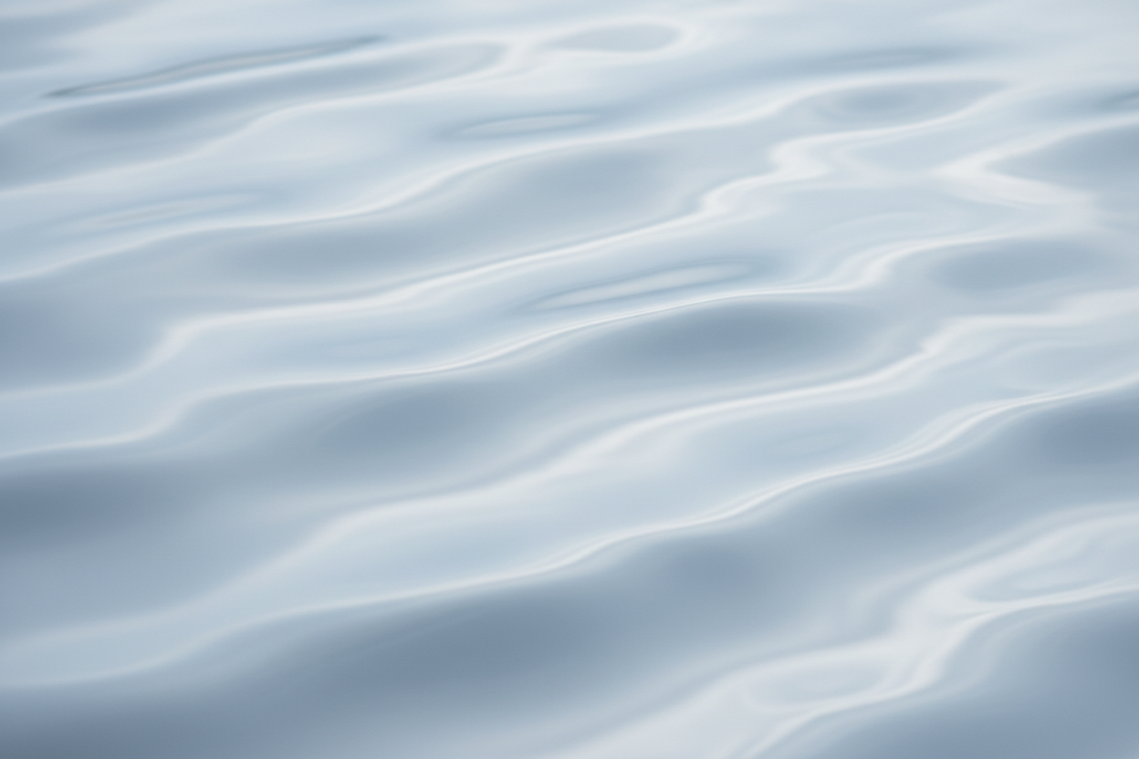 Soft ripples of pale blue water, still and unhurried